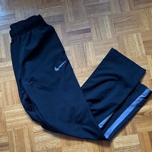 Nike Black Track Pants with Reflective Silver Swoosh and Side Stripe